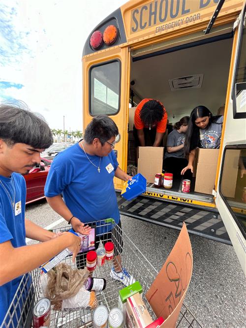 FBLA students "Stuff the Bus" with over 700, 000 pounds of food