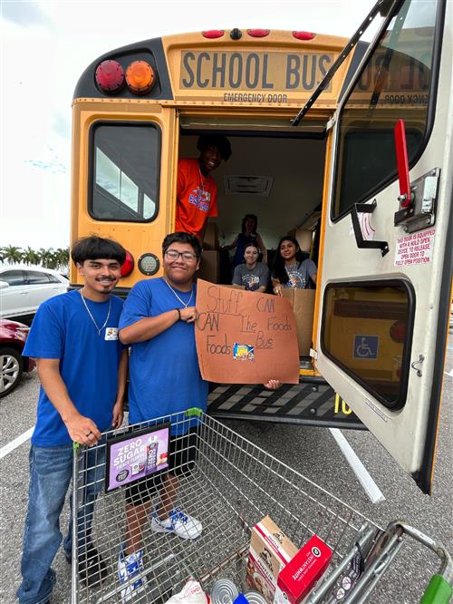 FBLA Students at "Stuff the Bus" with canned food