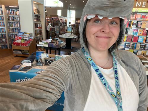 Advisor Savannah Finley in her Shark Costume at the club book fair.