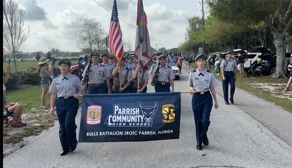 JROTC marching in a parade.