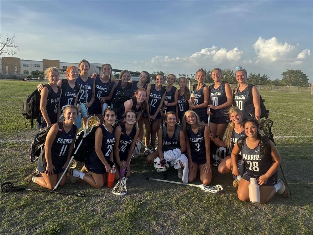  Team photo of the girls lacrosse team.