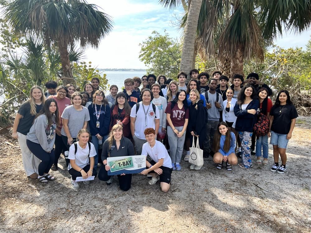  Group photo from one of the field trips to Emerson Point with the Tampa Bay Estuary Program sign.