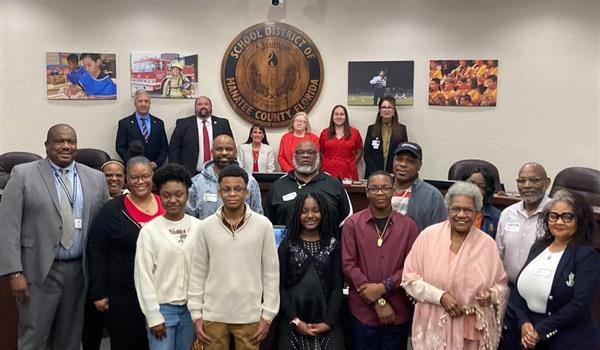 Johnson's family with the SDMC School Board.